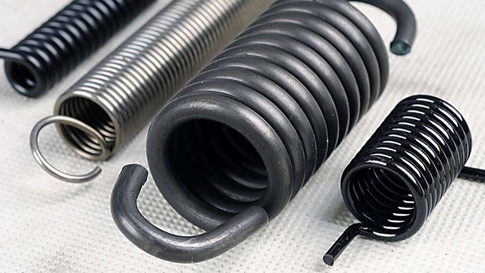Investigation and application of spring and its types in automotive industries