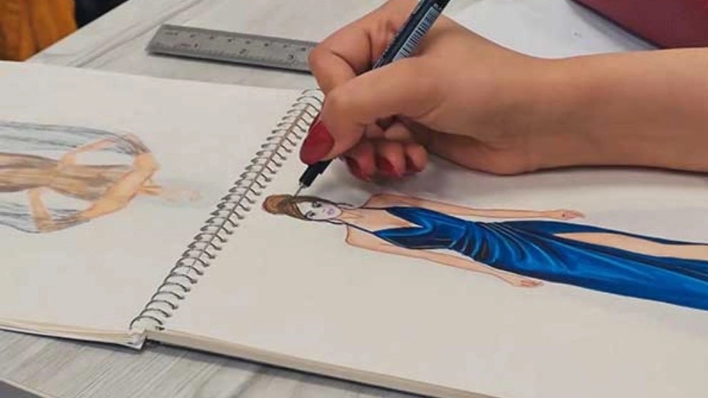 What elements does the clothing design process include?