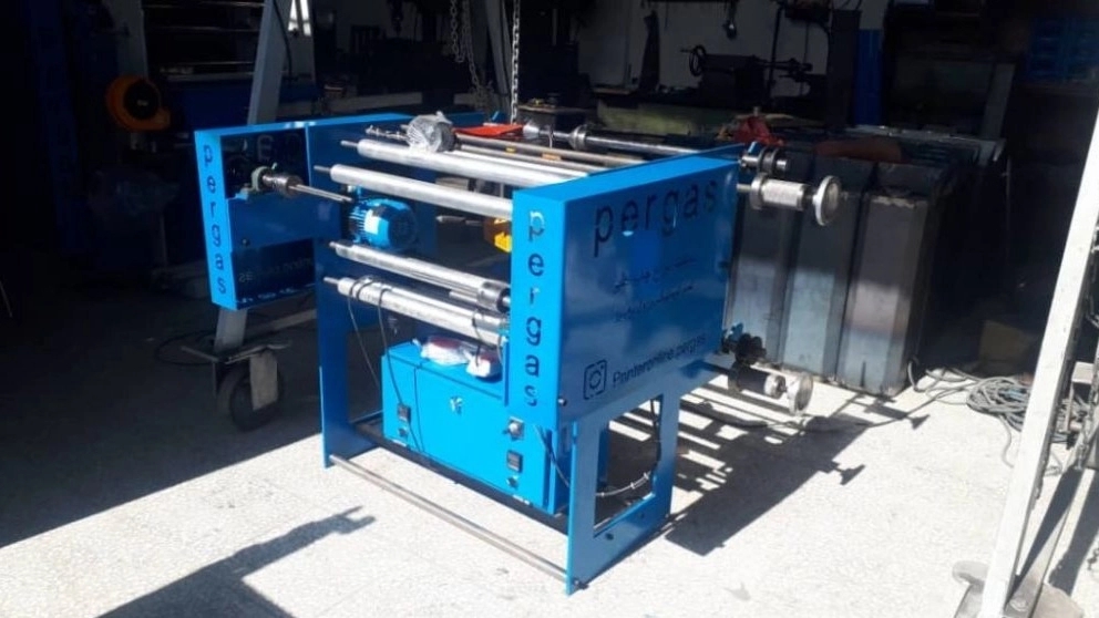 What is a disposable table roll machine?