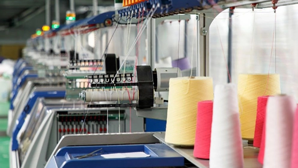 What steps does the fabric production process include?