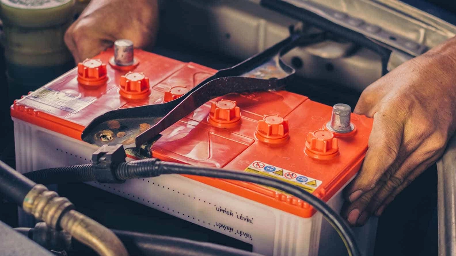 What are the components of a car battery?