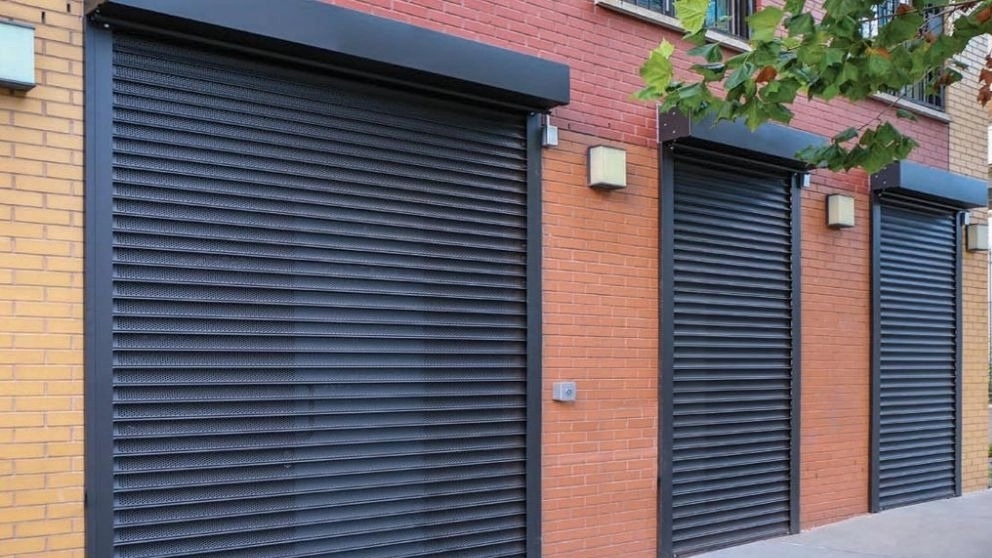 What are the advantages of electric shutters for shops and garage doors?