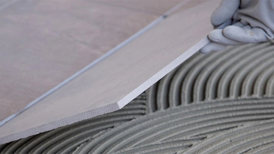 Does ceramic stick to cement?