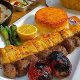 Traditional restaurant and outdoor food in a tent in Mashhad
