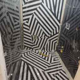Rahmani tile work, installation and implementation of ceramic tiles and slab work in Niavaran