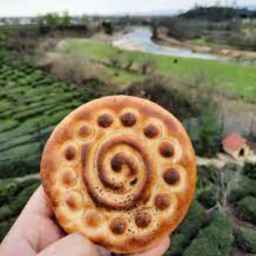 The local souvenirs of Gilan, te dil wa, production of rice bread and khoshkar string in Sangar
