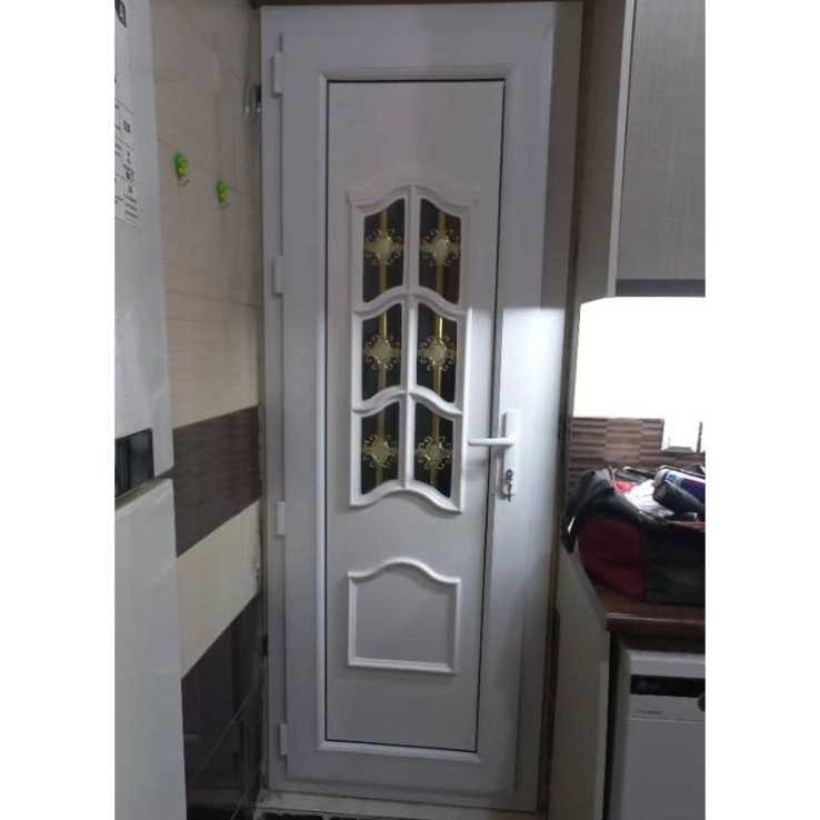 Door with waterproof decorative panel