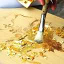 Implementation of gold leaf patina, embossing, all kinds of oil-based acrylic building paints, painting the Rainy building in Kerman