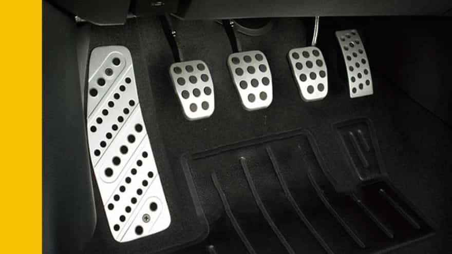Half clutch and auxiliary brake on the student's side for driving lessons