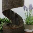 Implementation of fountain and barbecue with stones from Damavand mine