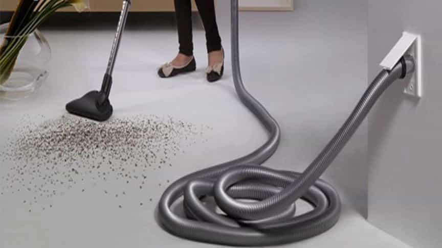What is a central sweeper and what are its advantages?