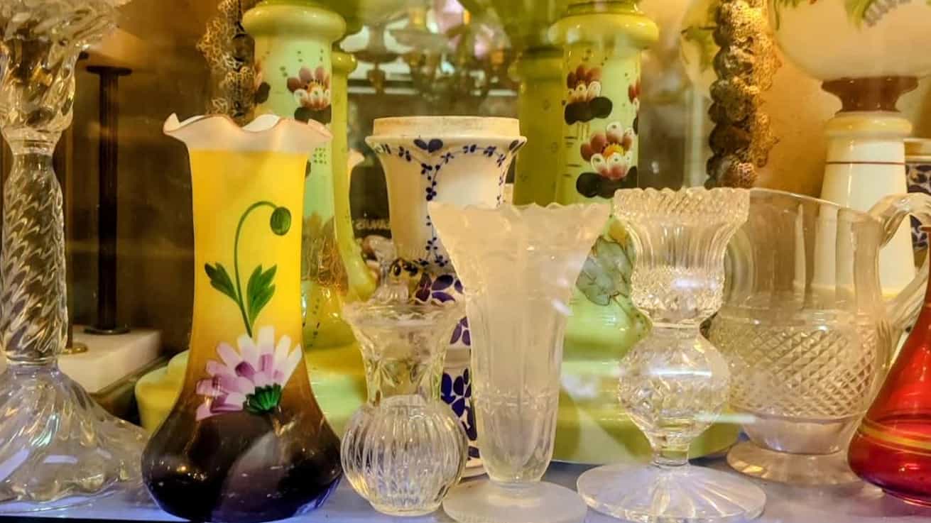 A buyer of broken and corroded small antique dishes in Karaj