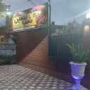 Cafe, restaurant and fast food at night in Langrod