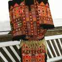 Zai Astin Naroi, designing and sewing traditional women's clothes in Zahedan