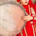 Banu Quchani's band of musicians, a player of the daf instrument for gatherings in Quchani
