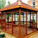 3007 Wooden Structures Group, design and implementation of the wooden facade of the building in Najaf Abad