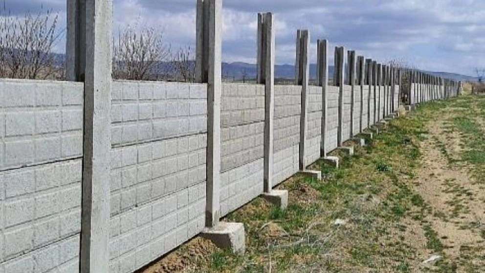 Concrete fence base