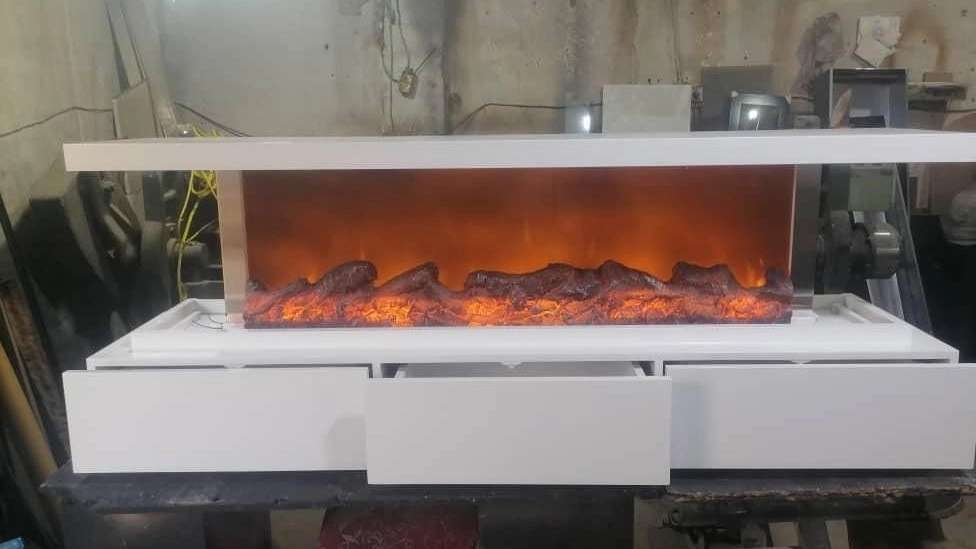 Electric and gas flame resistant fireplace