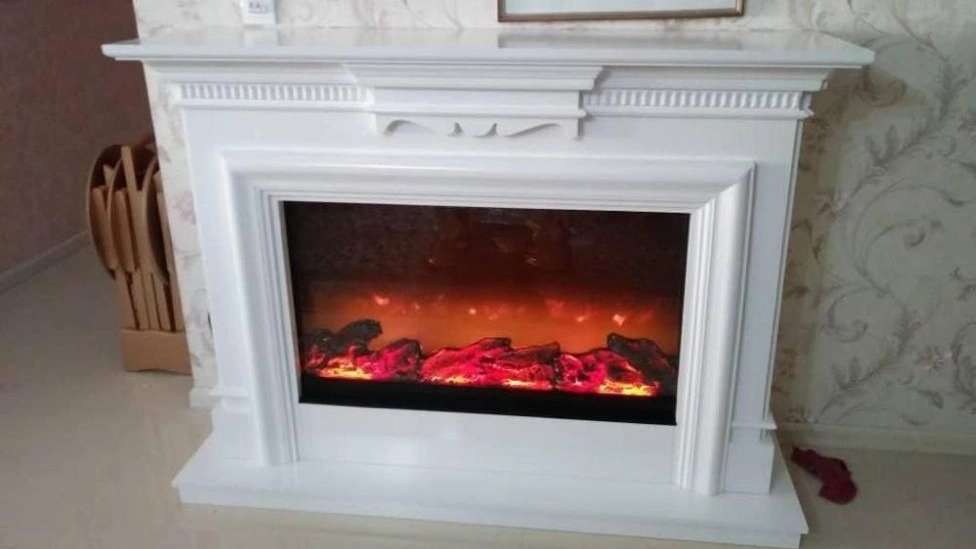 Electric and gas flame resistant fireplace