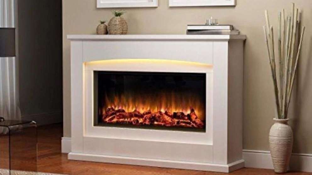 Electric and gas flame resistant fireplace