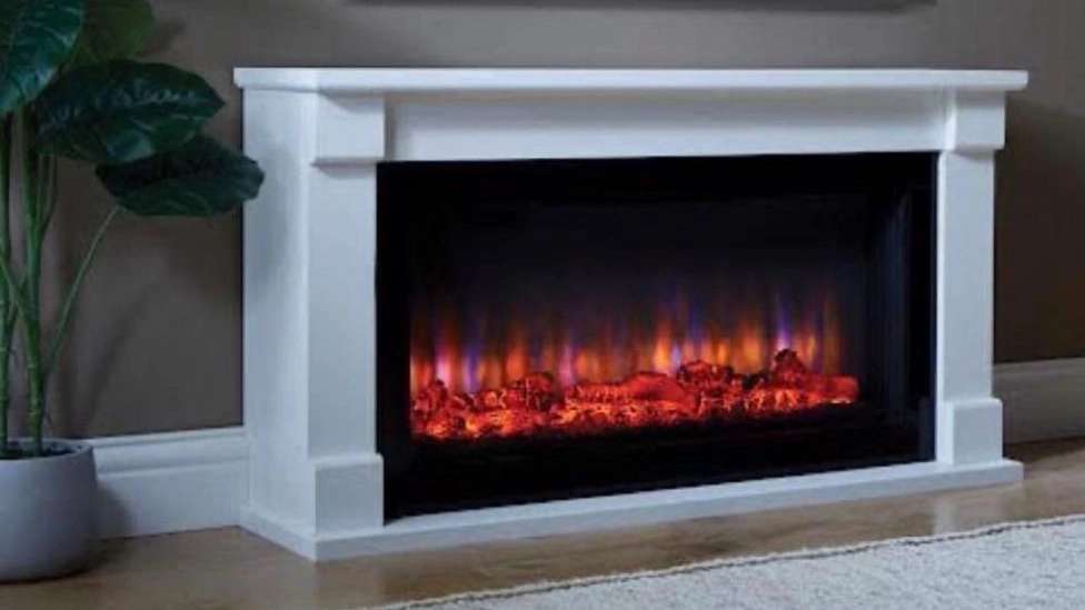 Electric and gas flame resistant fireplace