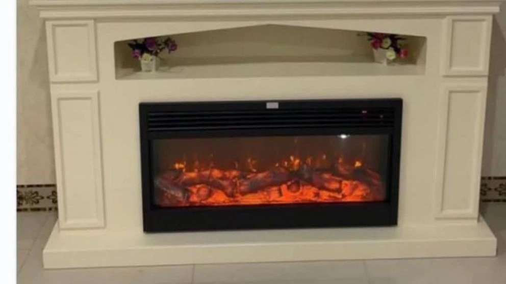 Electric and gas flame resistant fireplace