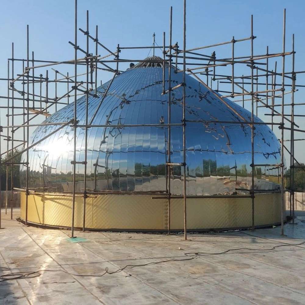 Construction of a dome with silver steel sheet and golden aluminum in Kuchsefahan, Kodosara village