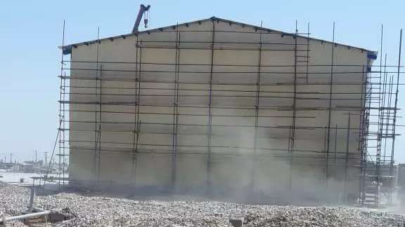 Installation of shed and roof covering
