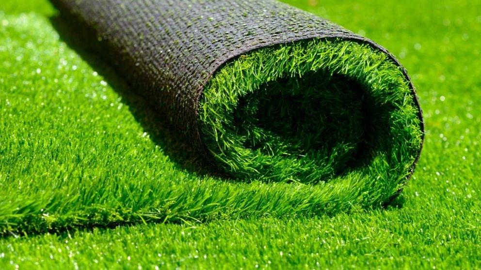 What is the production process of artificial grass?