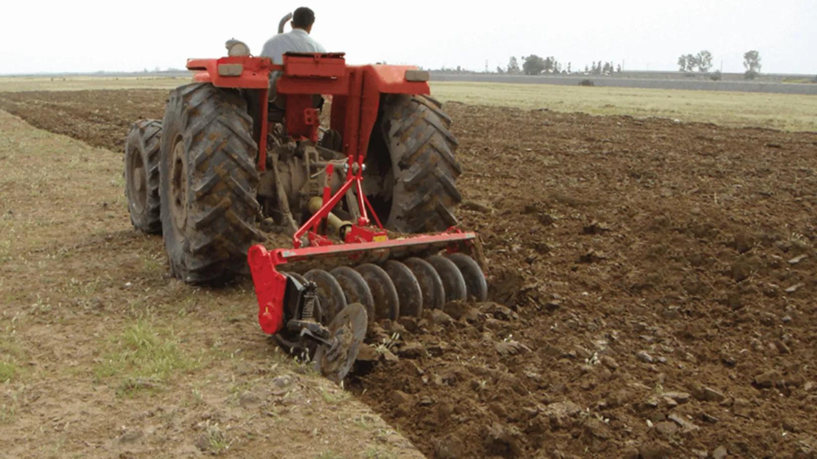 What are the benefits of plowing the soil?