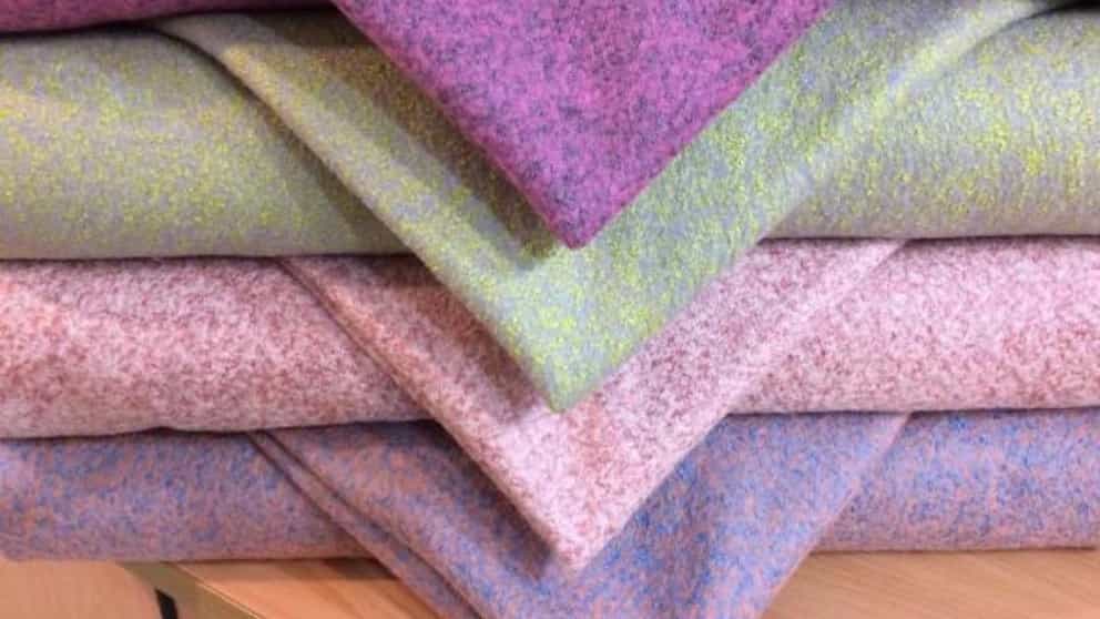 What is the woven fabric and the characteristics of the types