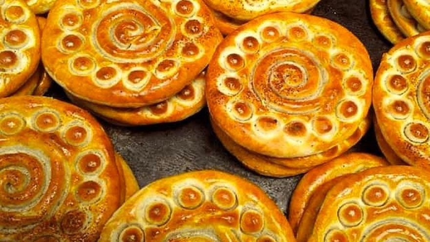Selling traditional cookies at Hiva cookie maker in Foman, Gilan