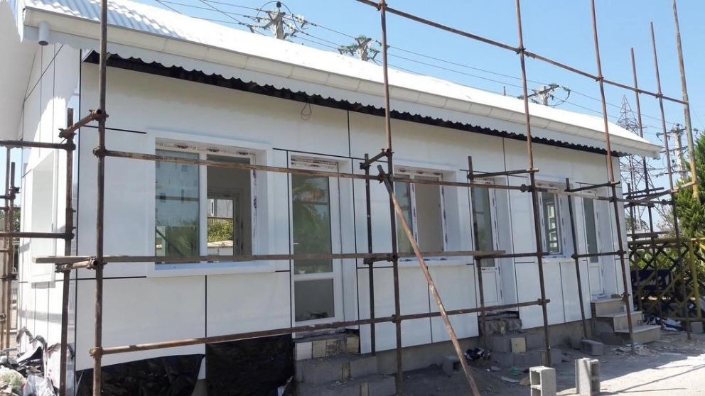 Reconstruction of facade with composite