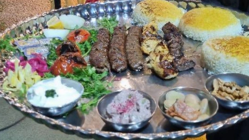 Experiencing authentic Iranian flavors at Homan Tourism Complex restaurant